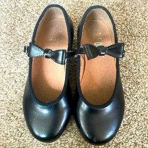 Bloch tap shoes size 10 with bow strap and buckle.
